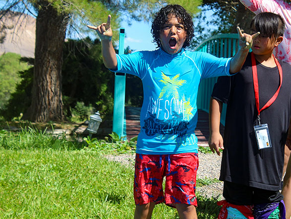 happy camper after finishing a run on the slip-and-slide