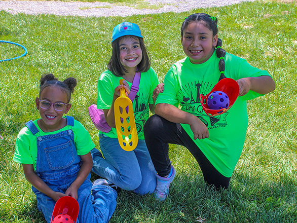 Campers showing off their jai alai rackets
