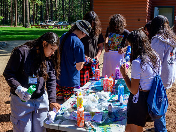 campers working on their tie dying skills