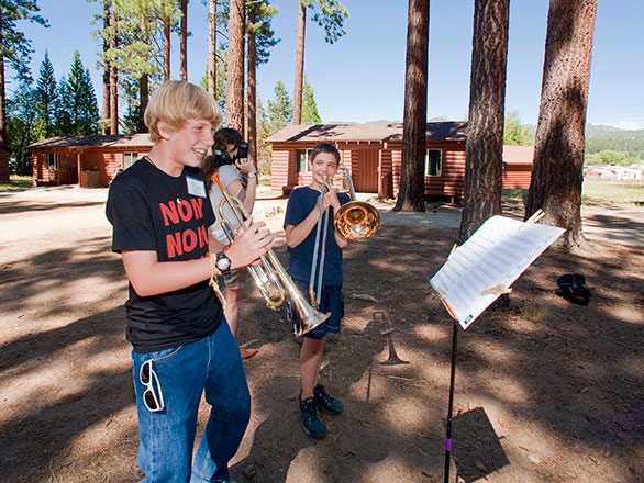 campers playing musical instruments