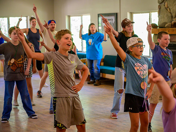 campers working on their disco dance moves