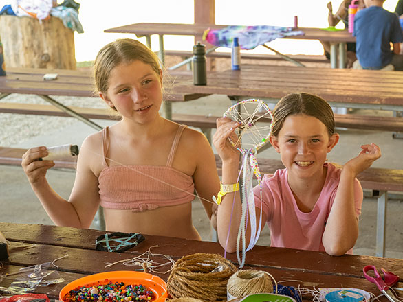 campers making dream catchers